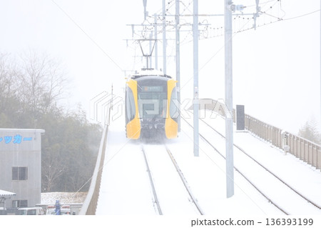 Utsunomiya Light Rail and heavy white snow 136393199
