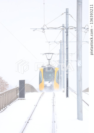 Utsunomiya Light Rail and heavy white snow Utsunomiya Light Rail and heavy white snow 136393211