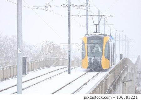 Utsunomiya Light Rail and heavy white snow Utsunomiya Light Rail and heavy white snow 136393221