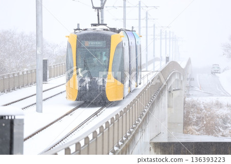 Utsunomiya Light Rail and heavy white snow Utsunomiya Light Rail and heavy white snow 136393223