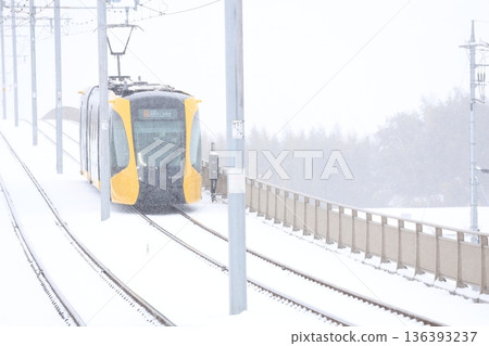 Utsunomiya Light Rail and heavy white snow Utsunomiya Light Rail and heavy white snow 136393237
