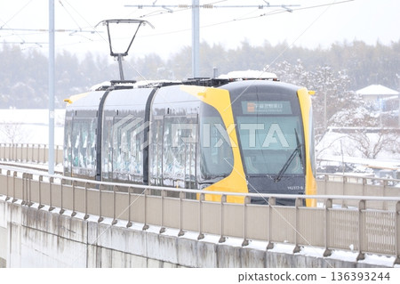 Utsunomiya Light Rail and heavy white snow Utsunomiya Light Rail and heavy white snow 136393244