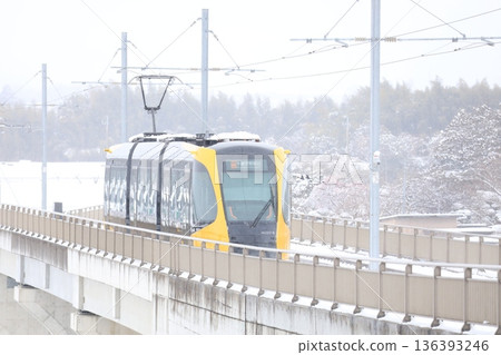 Utsunomiya Light Rail and heavy white snow 136393246