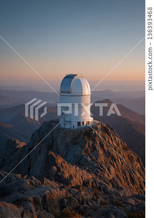 Astronomers assembling a state-of-the-art telescope on top of a rugged mountain peak. 136393468