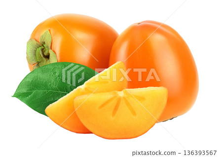 slice of Persimmon fruit with leaves isolated on white background close-up slice of Persimmon fruit with leaves isolated on white background close-up 136393567