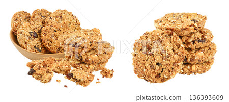 Granola cookie in wooden bowl isolated on white background with full depth of field. 136393609