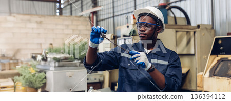 Workers Factory or Engineering work at factory site check up machine or products in site. Workers Factory or Engineering work at factory site check up machine or products in site. 136394112