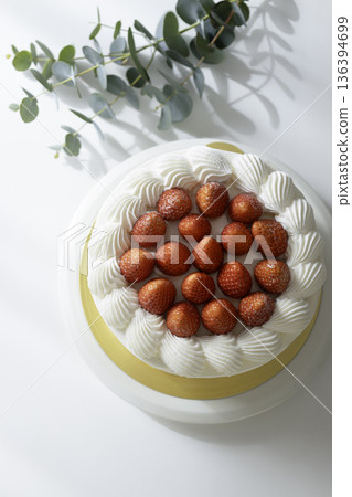 Strawberry cake with eucalyptus, flat lay, natural light 136394699