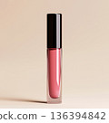 Luxury lip gloss tube on clean minimal background. Lip shine, glaze, plumper, jelly, oil. Premium decorative cosmetic, professional makeup, fashion, beauty concepts. High end product marketing visuals 136394842