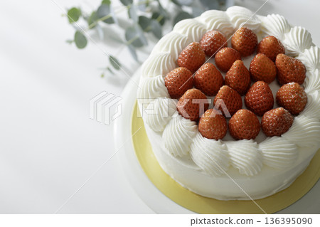 Homemade strawberry shortcake and eucalyptus. Bright sweets photo in natural light. Homemade strawberry shortcake and eucalyptus. Bright sweets photo in natural light. 136395090