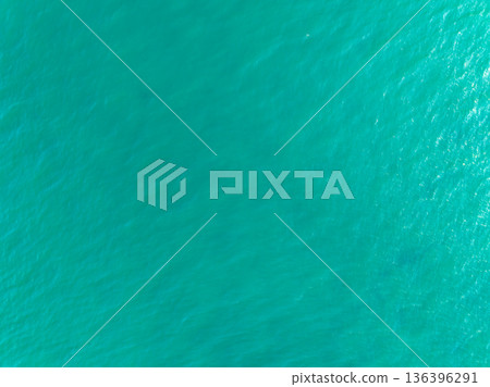 Aerial top view sea surface ocean waves texture nature background Aerial top view sea surface ocean waves texture nature background 136396291