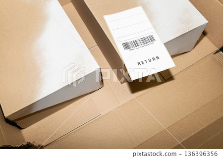 Online order return package with receipt document Online order return package with receipt document 136396356