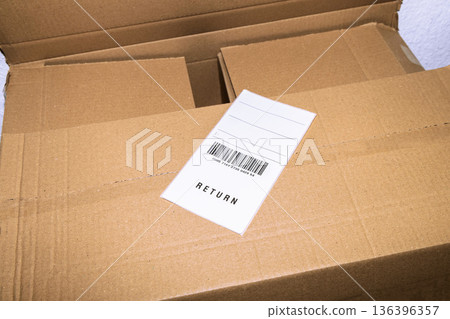 Online order return package with receipt document 136396357