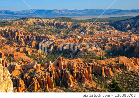 Views of Bryce Canyon during daylight with rock formations and trees Views of Bryce Canyon during daylight with rock formations and trees 136396708