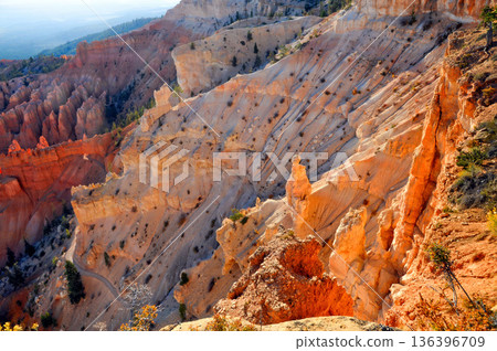 Explore the unique rock formations and slopes of Bryce Canyon in the USA during daytime 136396709