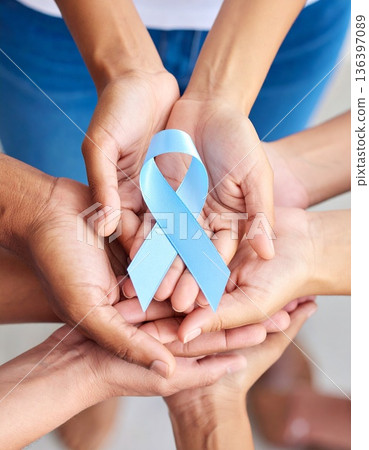 A diverse group of hands holds a diabetes awareness ribbon, symbolizing unity and collective support. A diverse group of hands holds a diabetes awareness ribbon, symbolizing unity and collective support. 136397089