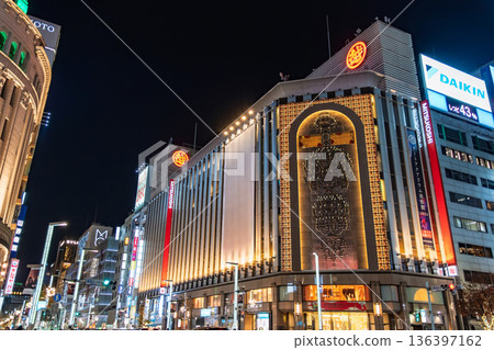Ginza 4-chome intersection at night, Chuo Ward, Tokyo. Ginza Mitsukoshi chandelier and Wako Clock Tower. Ginza 4-chome intersection at night, Chuo Ward, Tokyo. Ginza Mitsukoshi chandelier and Wako Clock Tower. 136397162
