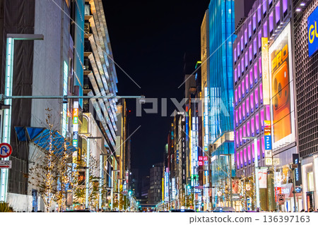 Glittering streetscape and neon signs of Ginza Chuo-dori at night in Chuo Ward, Tokyo 136397163