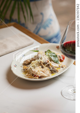 Italian chicken pasta with mushrooms and wine Italian chicken pasta with mushrooms and wine 136397842
