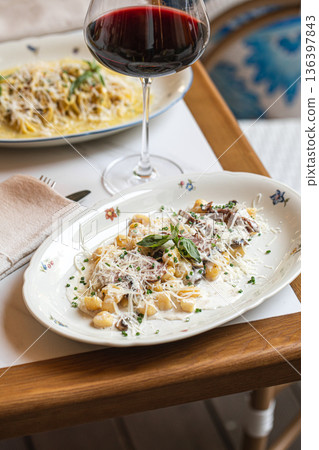 Italian pasta and gnocchi with meat and mushrooms Italian pasta and gnocchi with meat and mushrooms 136397843