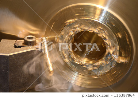 Close Up of Lathe Machine Cutting Brass Parts in Precision Machining Process Close Up of Lathe Machine Cutting Brass Parts in Precision Machining Process 136397964