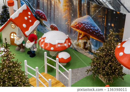 Festive Christmas display showcasing cheerful gnomes, whimsical mushroom houses, and sparkling trees, creating a magical winter wonderland scene for holiday joy Festive Christmas display showcasing cheerful gnomes, whimsical mushroom houses, and sparkling trees, creating a magical winter wonderland scene for holiday joy 136398011