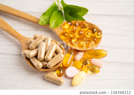 Alternative medicine herbal organic capsule drug herb. 136398212