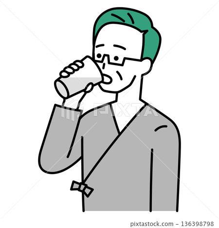 一名身穿檢查服的中年男子正在服用鋇劑。 136398798