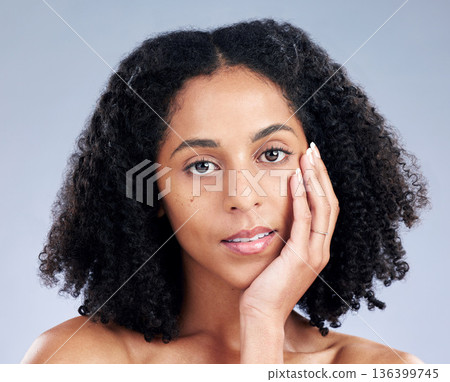 Portrait, hair and beauty with a model woman in studio on a gray background for skincare. Face, aesthetic and shampoo with a young female person at the salon for natural wellness or treatment 136399745