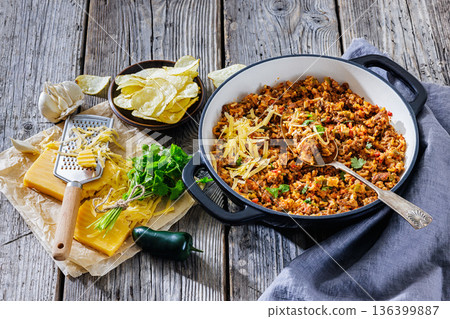 Texas hash of beef pepper onion tomato and rice 136399887