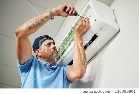 Maintenance, ac repair and air conditioner with man and screwdriver for electrician, ventilation and power. Engineering, electricity and inspection with technician and tools for fan and contractor 136399901