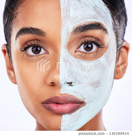 Skincare, portrait and woman in studio with facial, half and cosmetic treatment or dermatology. Face, mask and Indian female wellness model with cream, comparison or result, beauty and satisfaction Skincare, portrait and woman in studio with facial, half and cosmetic treatment or dermatology. Face, mask and Indian female wellness model with cream, comparison or result, beauty and satisfaction 136399914