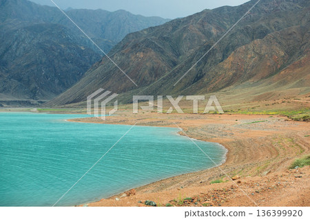 View of the mountain gorge from which the Bartogay reservoir is fed by water, reservoirs in the Almaty region of Kazakhstan nature. View of the mountain gorge from which the Bartogay reservoir is fed by water, reservoirs in the Almaty region of Kazakhstan nature. 136399920