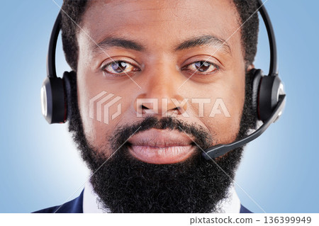 Customer service portrait, studio black man and serious consultant for tech support, help desk administration or telecom. Call center profile picture, face and African person face on blue background 136399949