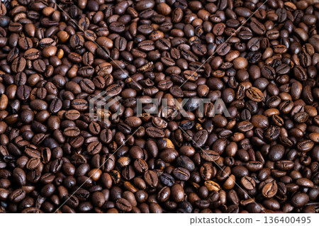 Textured backdrop roasted coffee beans pattern, shallow depth of field and rich brown gradient create versatile background for food and beverage visuals and branding 136400495