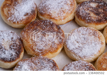 Savory cheese dishes and sweet treats, Crispy cheese snacks with syrup and warm pancakes, Delicious fried cheese pancakes and fresh syrniki for breakfast gathering Savory cheese dishes and sweet treats, Crispy cheese snacks with syrup and warm pancakes, Delicious fried cheese pancakes and fresh syrniki for breakfast gathering 136400502