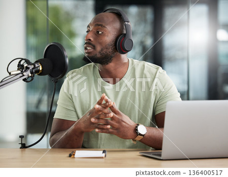 Black man, microphone and laptop, headphones and radio DJ with news, communication and audio equipment. Podcast, technology and multimedia with male person, talking with announcement and broadcast Black man, microphone and laptop, headphones and radio DJ with news, communication and audio equipment. Podcast, technology and multimedia with male person, talking with announcement and broadcast 136400517