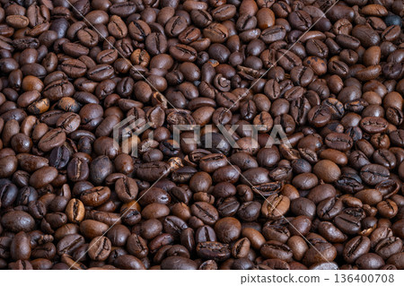 Aromatic coffee preparation, Cozy kitchen scene with fragrant roasted beans, Morning ritual ambiance featuring handground aromatic coffee beans on stylish kitchen counter Aromatic coffee preparation, Cozy kitchen scene with fragrant roasted beans, Morning ritual ambiance featuring handground aromatic coffee beans on stylish kitchen counter 136400708