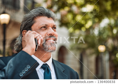 Phone call, thinking and vision with a business man in the city on his morning commute into work. Mobile, face and smile with a senior male CEO or manager talking while in an urban town for travel Phone call, thinking and vision with a business man in the city on his morning commute into work. Mobile, face and smile with a senior male CEO or manager talking while in an urban town for travel 136400838