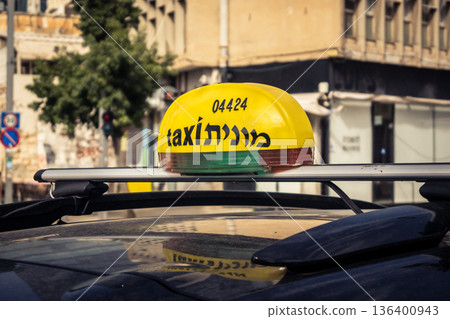 Tel Aviv, Israel, January 3, 2026 Taxis navigate the busy streets of downtown Tel Aviv, maintaining the city mobility and flow despite the ongoing regional conflict and heightened security tensions. 136400943
