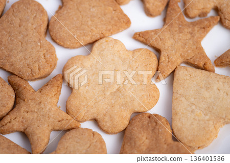 Detailed view of rustic cookies showcasing artisanal baking craftsmanship, Scene capturing smallbatch bakery cookies with textured surface and warm natural illumination 136401586