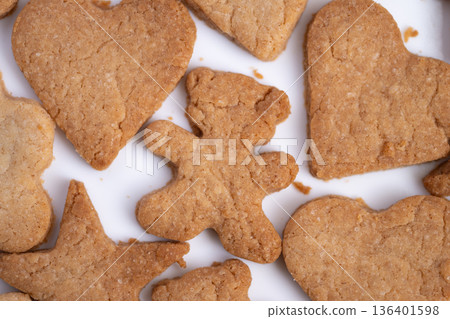 Playful cookies perfect for snacks, Baked teddy and heart shaped cookies for children, Decorative baked cookies in teddy and heart shapes suitable for lunchboxes or celebrations Playful cookies perfect for snacks, Baked teddy and heart shaped cookies for children, Decorative baked cookies in teddy and heart shapes suitable for lunchboxes or celebrations 136401598