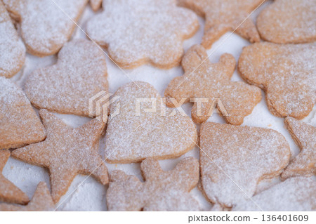 Sweet treats in charming designs, Homemade cookies with ecofriendly packaging display, Decorative sugar cookies prepped for gifts in various patterns and wrappers Sweet treats in charming designs, Homemade cookies with ecofriendly packaging display, Decorative sugar cookies prepped for gifts in various patterns and wrappers 136401609