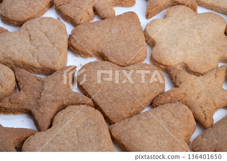 Assorted heartshaped pastries perfect for joyful celebration occasions, Brightly decorated heart flower cookies designed to bring cheer and share happiness at special events 136401650