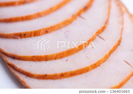 Closeup sliced smoked turkey breast thin even slices, goldenbrown edges, moist interior, soft studio lighting, white background, ideal for packaging, menu, recipe imagery Closeup sliced smoked turkey breast thin even slices, goldenbrown edges, moist interior, soft studio lighting, white background, ideal for packaging, menu, recipe imagery 136401665