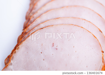 Mealprep ham slices ready for lunchboxes, neatly arranged thin rounds showing consistent cut and texture, practical option for quick meal planning and fridge storage Mealprep ham slices ready for lunchboxes, neatly arranged thin rounds showing consistent cut and texture, practical option for quick meal planning and fridge storage 136401674