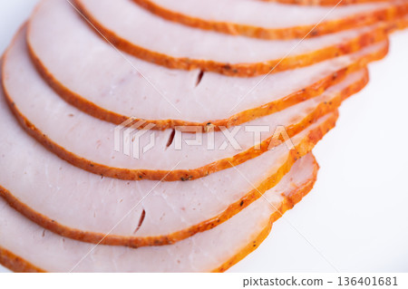 Elegant sliced meat. Gourmet meat platter presentation. Refined meat display with stylish curves. Luxurious sliced meat arrangement showcasing polished finishes and smooth designs 136401681