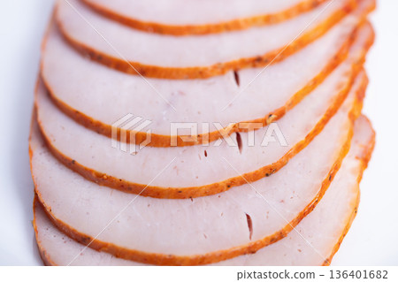 Detailed image of smoked turkey with perfect layering and texture. Highquality image showcasing thinly sliced smoked turkey with crisp edges and moist interior on white background Detailed image of smoked turkey with perfect layering and texture. Highquality image showcasing thinly sliced smoked turkey with crisp edges and moist interior on white background 136401682