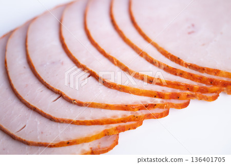Consistent sliced turkey layout for menus. Precisely spaced turkey slices on white backdrop with high lighting emphasizing clean edges for catalog and menu layouts Consistent sliced turkey layout for menus. Precisely spaced turkey slices on white backdrop with high lighting emphasizing clean edges for catalog and menu layouts 136401705