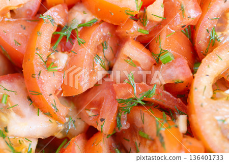 Refined garden fresh tomato assortment display. Sophisticated presentation of assorted heirloom tomatoes drizzled with olive oil and garnished with fresh microgreens Refined garden fresh tomato assortment display. Sophisticated presentation of assorted heirloom tomatoes drizzled with olive oil and garnished with fresh microgreens 136401733